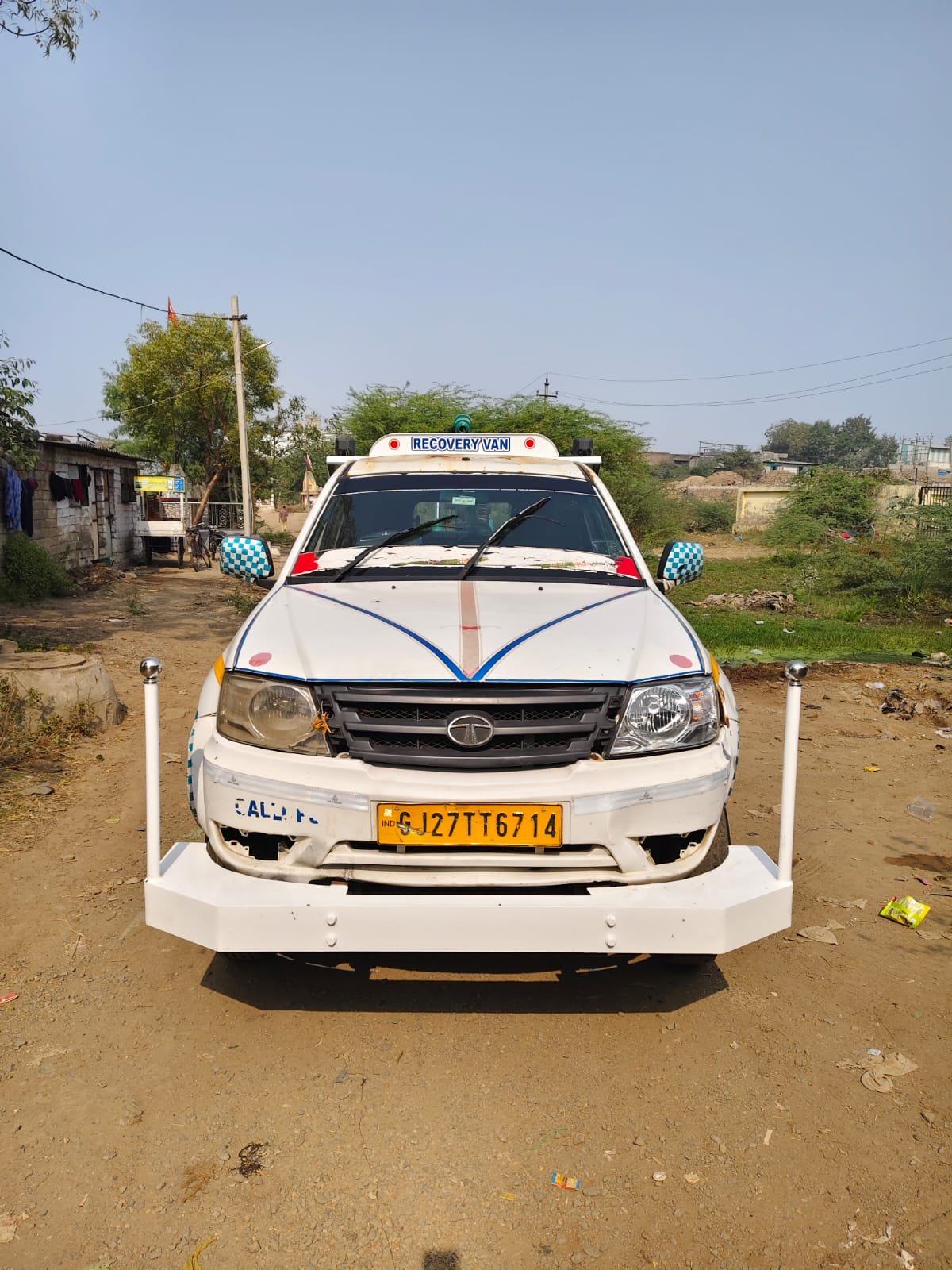 Urvi Crane recovery van, a Tata Yodha pickup fitted with a hydraulic tow crane, parked in Bhavnagar